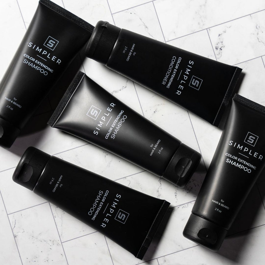 Set of five SIMPLER HAIR COLOR shampoo and conditioner tubes in a sampler kit, displayed together with colorful packaging.