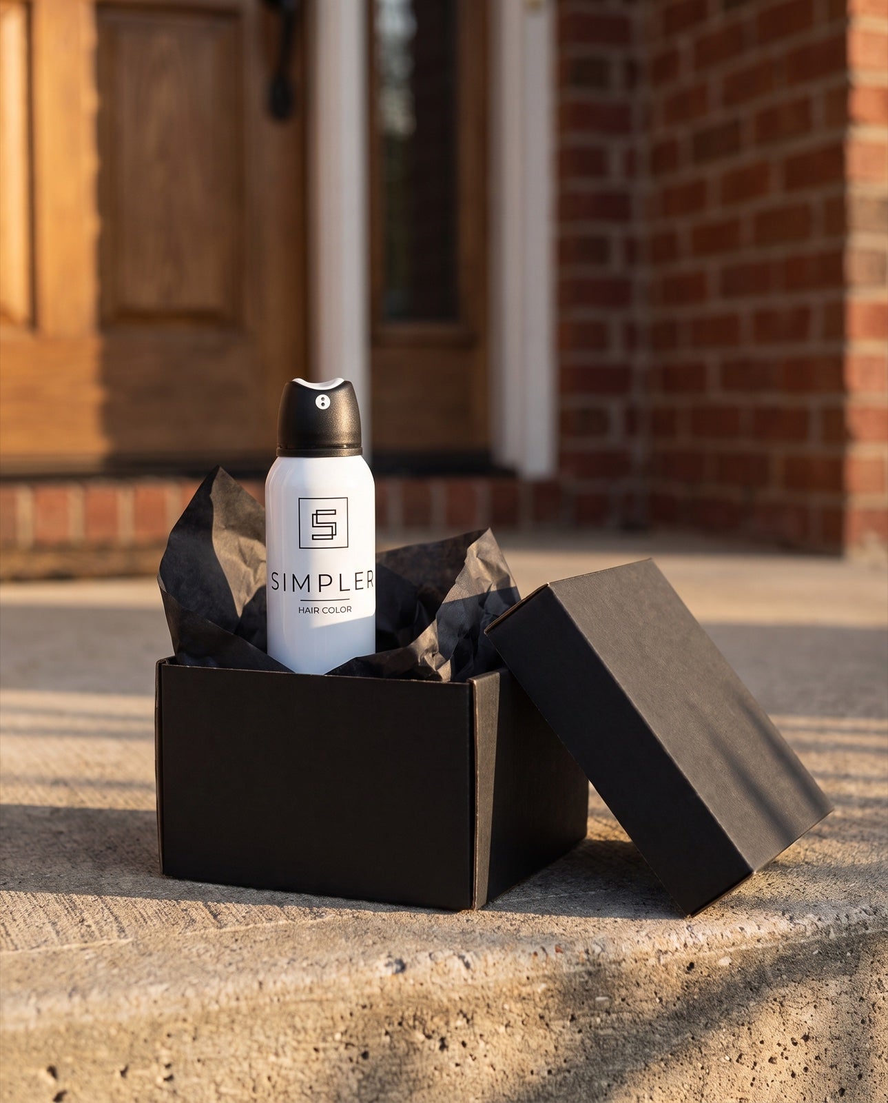SIMPLER hair color in an open black box on a doorstep