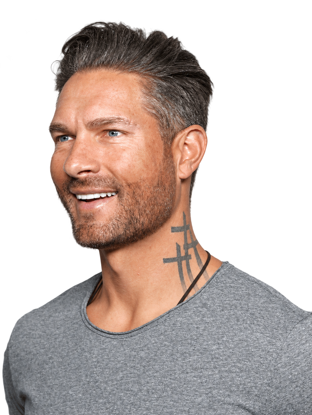 A smiling man with styled salt-and-pepper hair and a short beard.